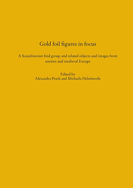 Gold foil figures in focus